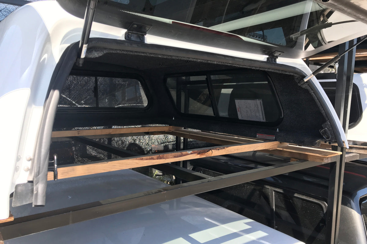 Rear framed door bottom flap seal