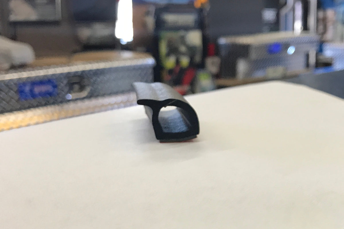 Rear framed door bottom flap seal